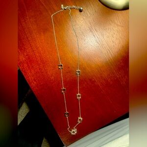 Like new Kate Spade cutout silver plated necklace; beautiful; perfect gift!